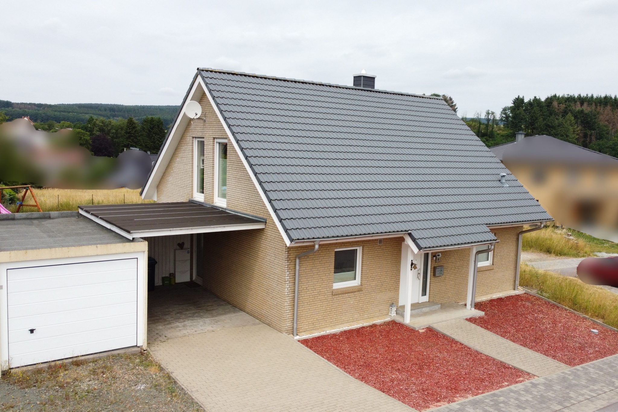 Volksbank Trier Immobilien GmbH - Immobilienangebot - Schillingen - Alle - Modernes Einfamilienhaus in Schillingen - Wohnkomfort und Ruheoase vereint