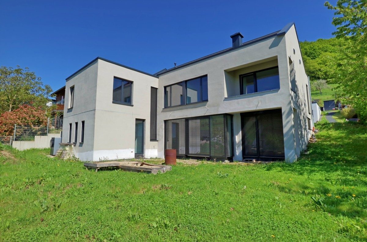Volksbank Trier Eifel Immobilien GmbH - Immobilienangebot - Kasel - Alle - Naturnah, modern und energieeffizienzt - Neubau-Einfamilienhaus mit Einliegerwohnung in Kasel
