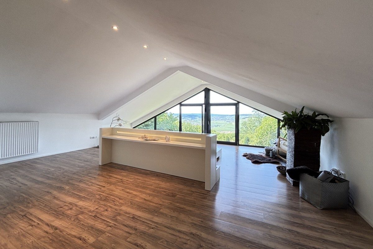 Volksbank Trier Eifel Immobilien GmbH - Immobilienangebot - Leiwen - Alle - Mit der Natur auf Augenhöhe - Exklusives Traumhaus in Leiwen