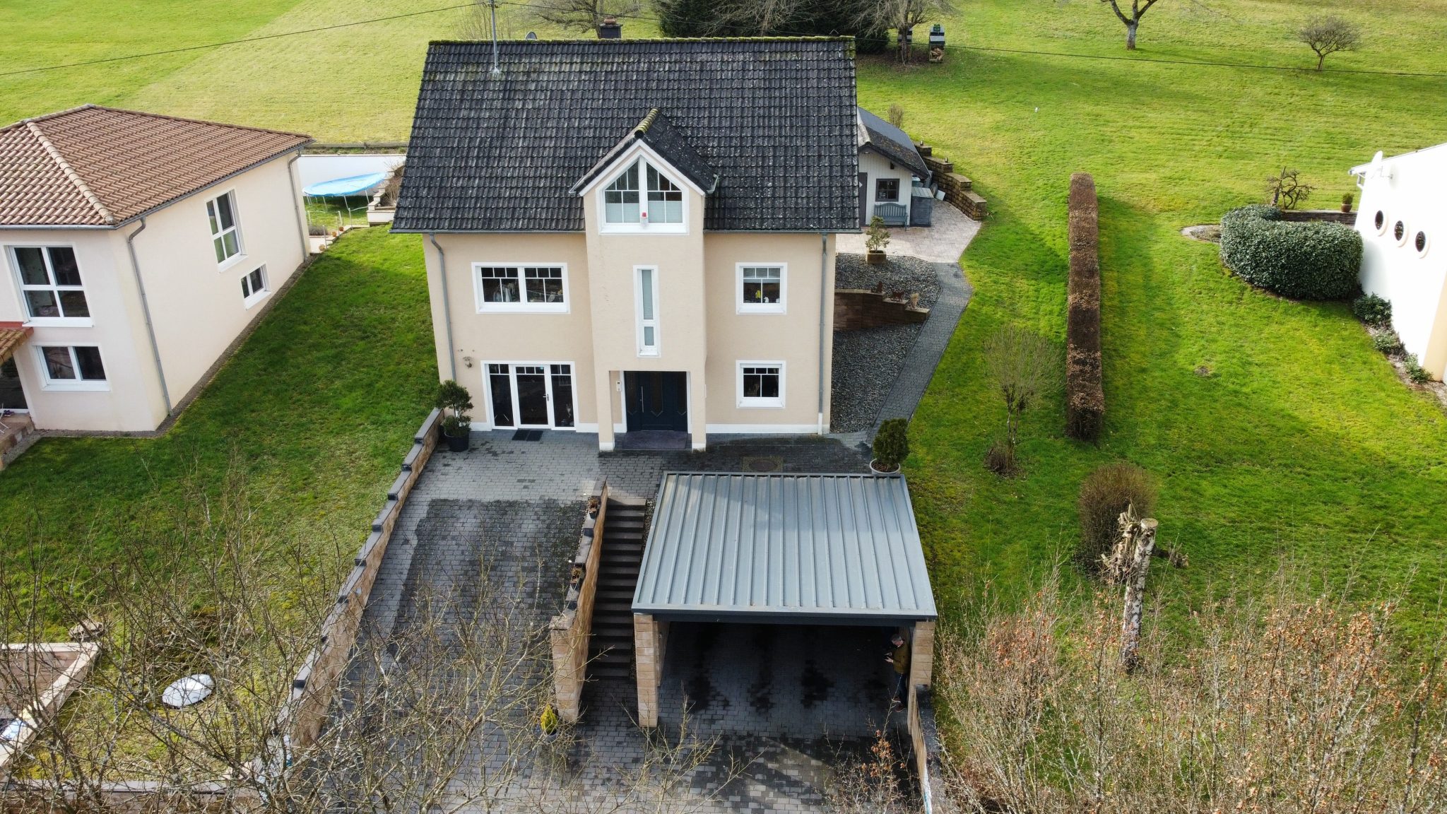 Volksbank Trier Eifel Immobilien GmbH - Immobilienangebot - Hüttingen an der Kyll - Alle - Ankommen im Grünen: Ihr Einfamilienhaus in Hüttingen an der Kyll