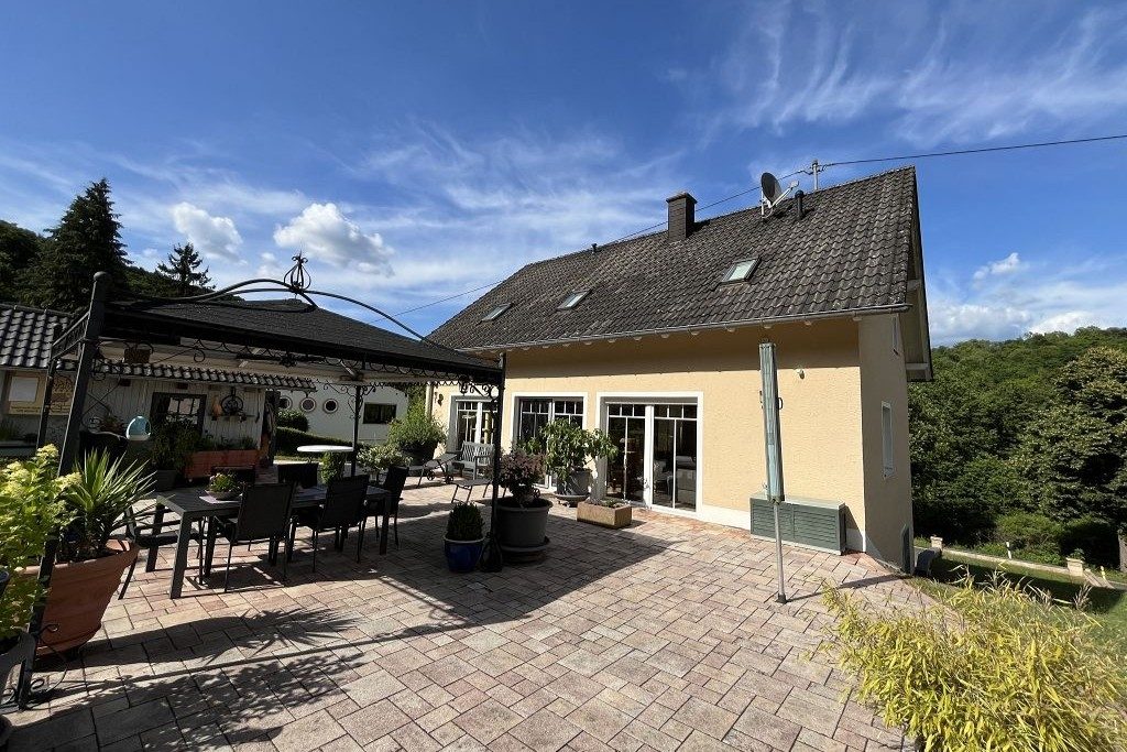 Volksbank Trier Eifel Immobilien GmbH - Immobilienangebot - Hüttingen an der Kyll - Alle - Ankommen im Grünen: Ihr Einfamilienhaus in Hüttingen an der Kyll