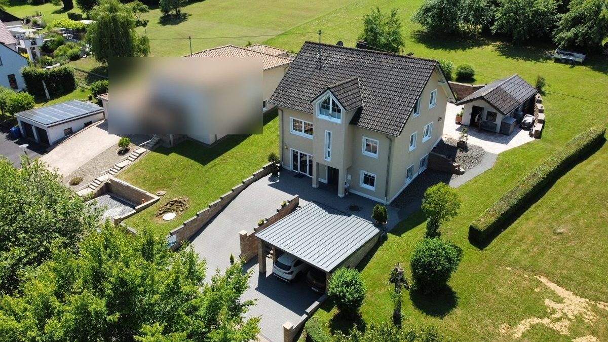 Volksbank Trier Eifel Immobilien GmbH - Immobilienangebot - Hüttingen an der Kyll - Alle - Ankommen im Grünen: Ihr Einfamilienhaus in Hüttingen an der Kyll