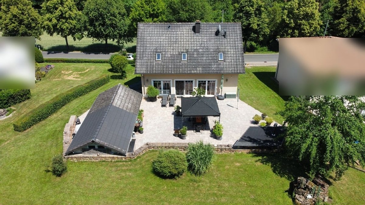 Volksbank Trier Eifel Immobilien GmbH - Immobilienangebot - Hüttingen an der Kyll - Alle - Ankommen im Grünen: Ihr Einfamilienhaus in Hüttingen an der Kyll
