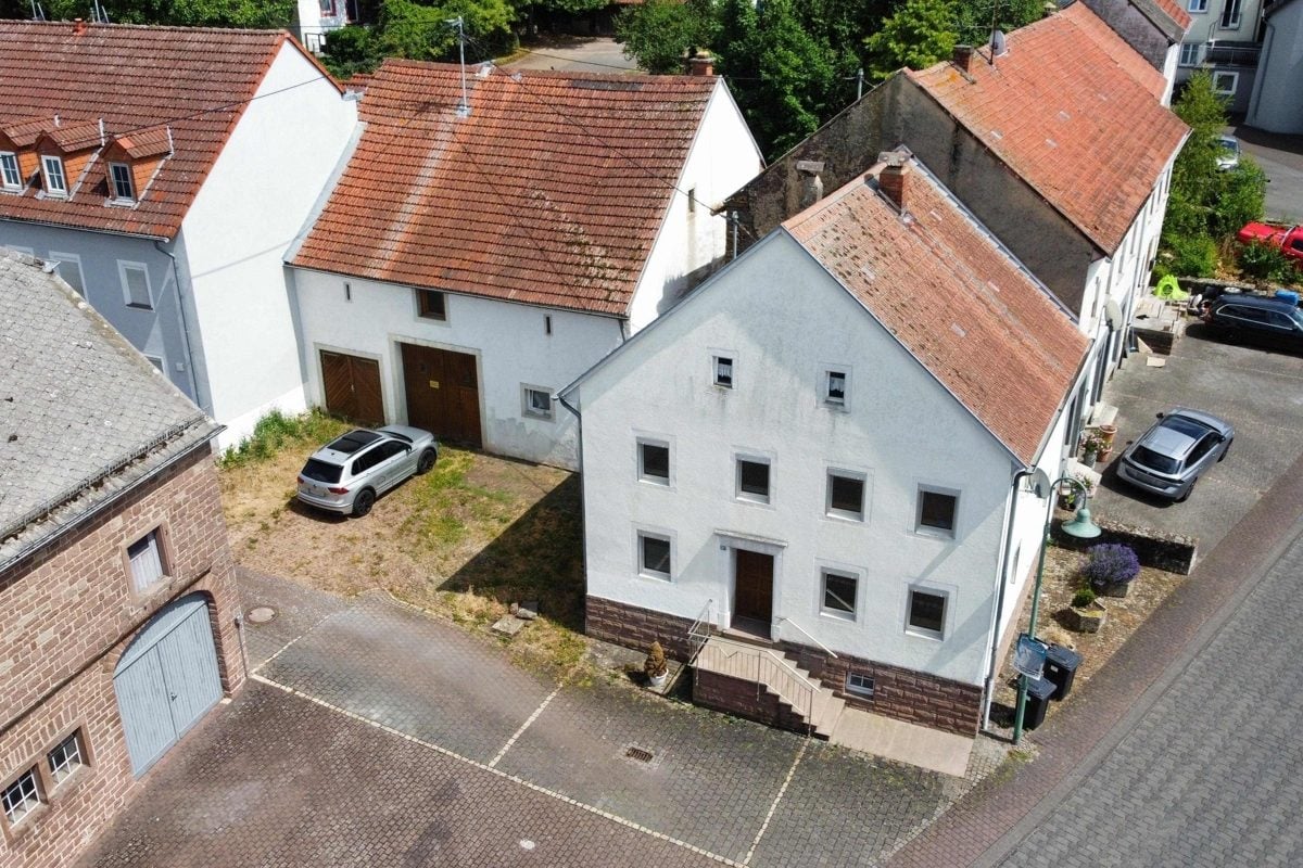 Volksbank Trier Eifel Immobilien GmbH - Immobilienangebot - Spangdahlem - Alle - Gemütliches Einfamilienhaus mit Nebengebäude und zusätzlichem Gartengrundstück in Spangdahlem