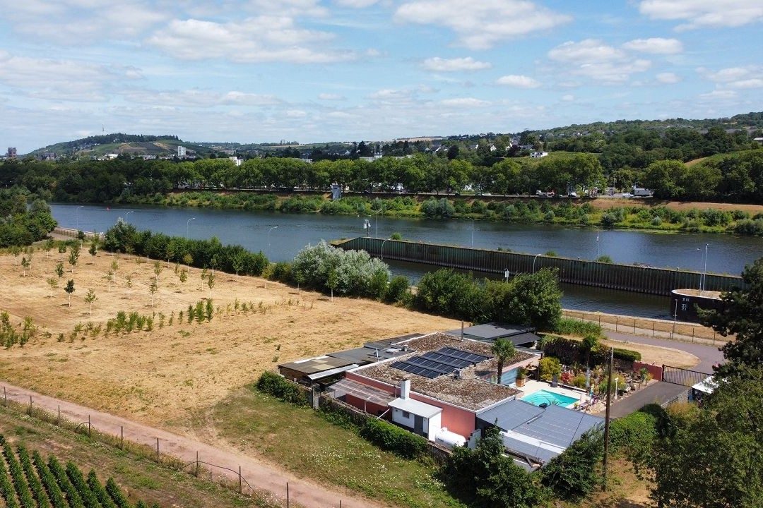 Volksbank Trier Eifel Immobilien GmbH - Immobilienangebot - Trier-Euren - Alle - Exklusiver Bungalow in Trier-Euren – Ihr privates Urlaubsparadies mit Moselblick