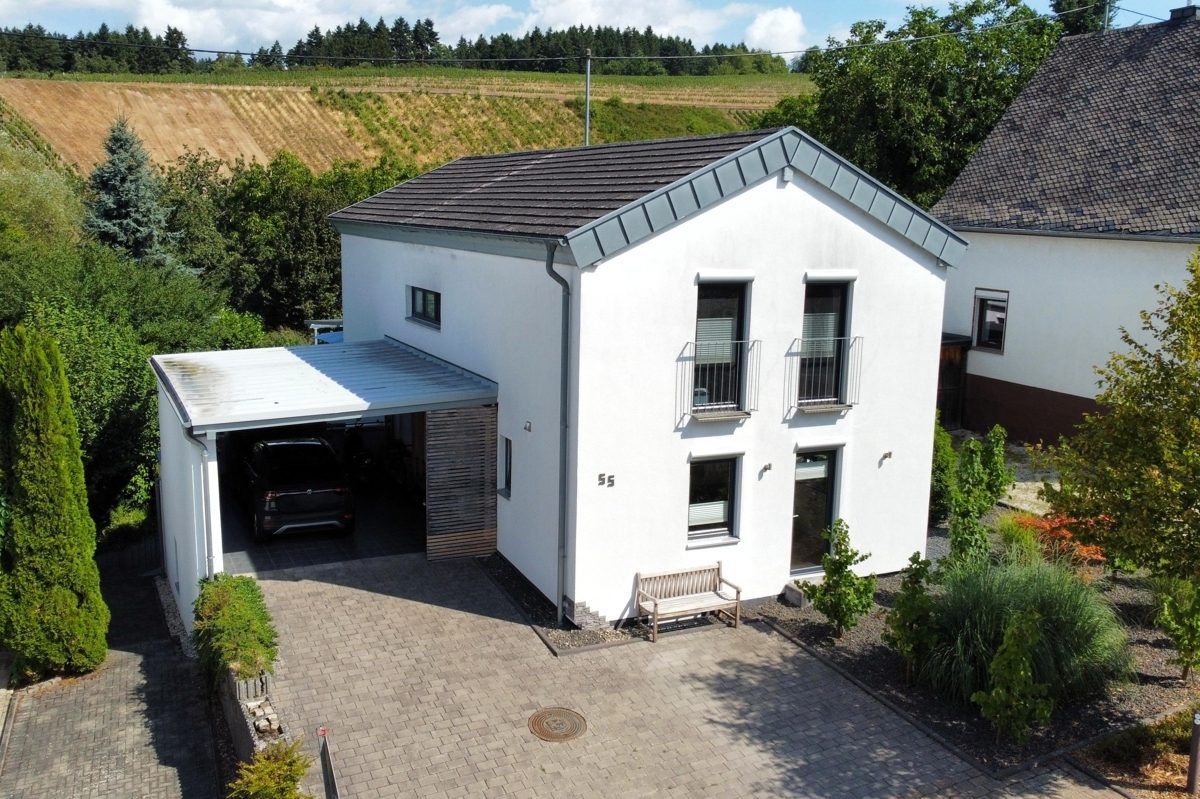 Volksbank Trier Eifel Immobilien GmbH - Immobilienangebot - Mertesdorf - Alle - Modernes Einfamilienhaus mit Einliegerwohnung,
Garten und Terrasse in Mertesdorf