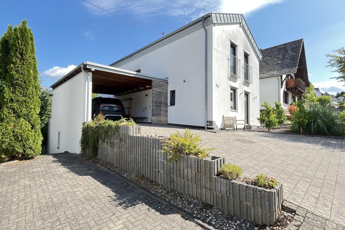 Volksbank Trier Eifel Immobilien GmbH - Immobilienangebot - Mertesdorf - Alle - Modernes Einfamilienhaus mit Einliegerwohnung,
Garten und Terrasse in Mertesdorf