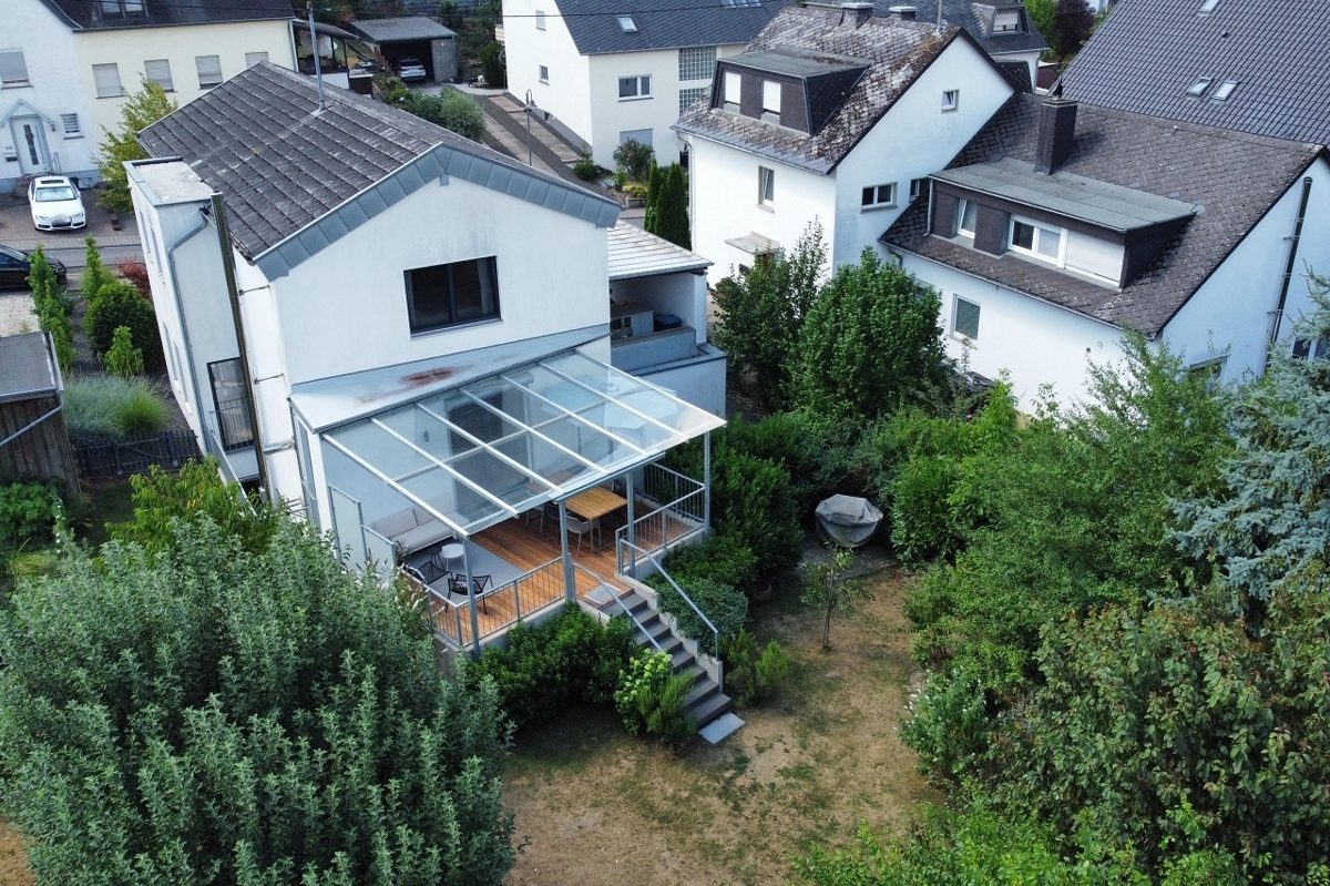 Volksbank Trier Eifel Immobilien GmbH - Immobilienangebot - Mertesdorf - Alle - Modernes Einfamilienhaus mit Einliegerwohnung,
Garten und Terrasse in Mertesdorf