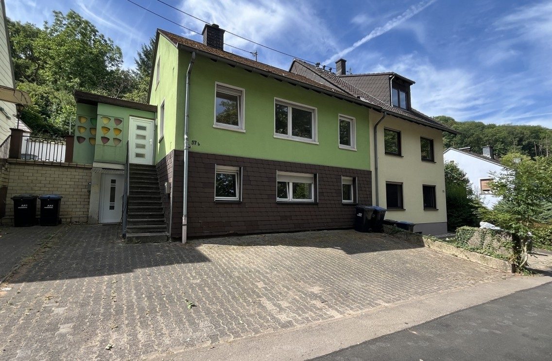Volksbank Trier Eifel Immobilien GmbH - Immobilienangebot - Trier-Kürenz - Alle - Zweifamilienhaus in Trier-Kürenz mit Entwicklungspotenzial 
und kurzen Wegen zur Uni und Innenstadt