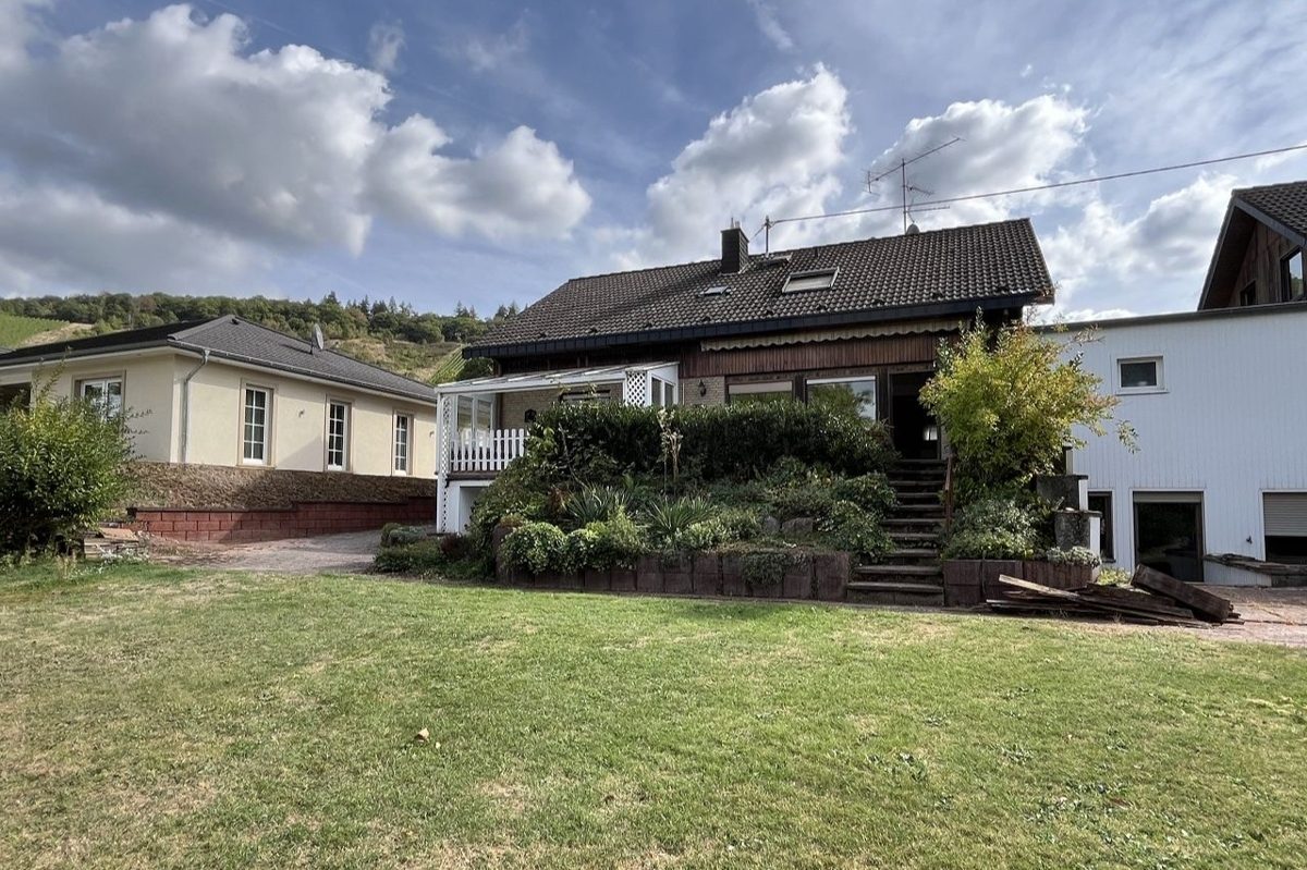 Volksbank Trier Eifel Immobilien GmbH - Immobilienangebot - Konz - Alle - Gepflegtes Zweifamilienhaus mit Einliegerwohnung und großem Garten in Konz-Filzen