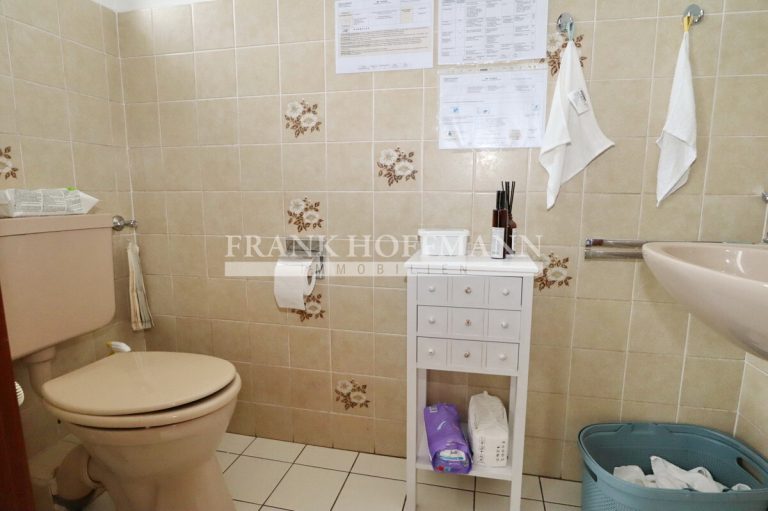 Immobilienangebot - Henstedt-Ulzburg - Alle - Gewerblich vermietetes Endreihenhaus mit vielseitiger Nutzungsmöglichkeit in Henstedt-Ulzburg