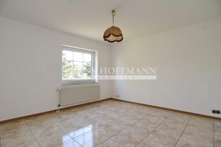 Immobilienangebot - Kaltenkirchen - Alle - Einfamilienhaus mit vermieteter Einliegerwohnung in Kaltenkirchen
