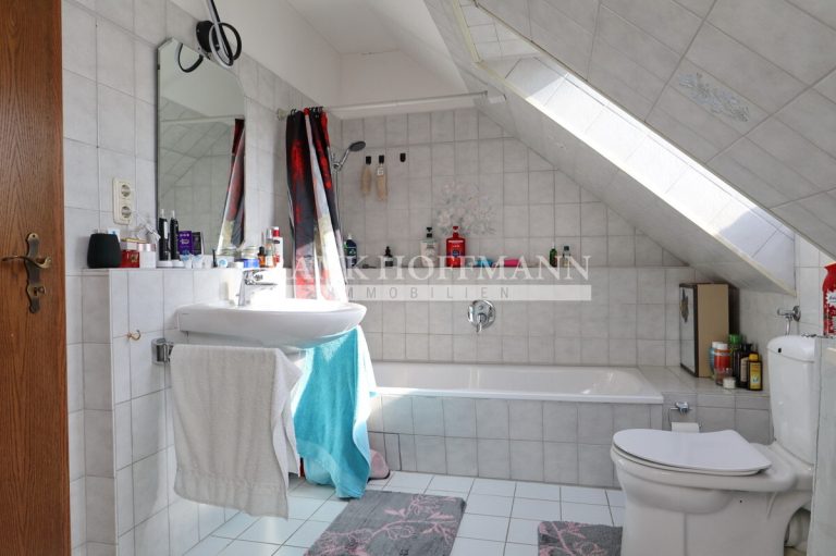 Immobilienangebot - Kaltenkirchen - Alle - Einfamilienhaus mit vermieteter Einliegerwohnung in Kaltenkirchen