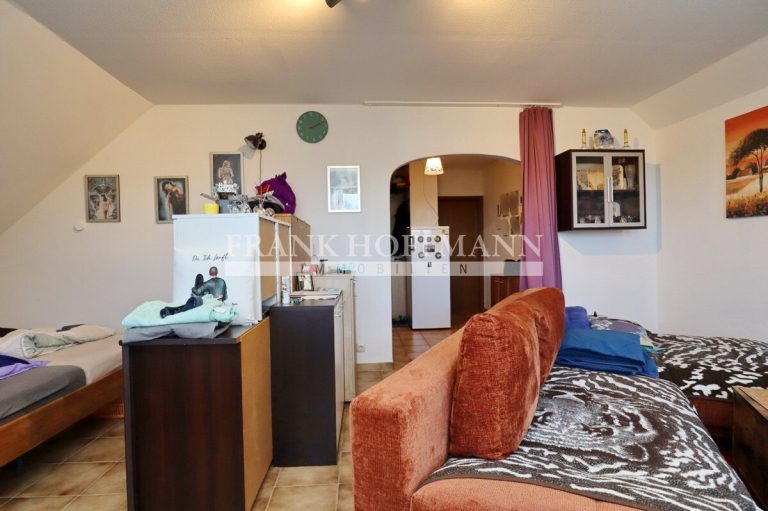 Immobilienangebot - Kaltenkirchen - Alle - Einfamilienhaus mit vermieteter Einliegerwohnung in Kaltenkirchen