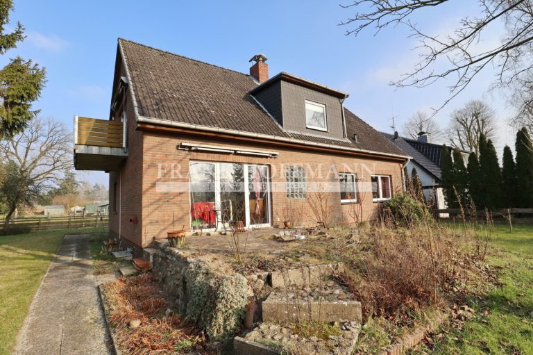 Immobilienangebot - Hartenholm - Alle - Teilvermietetes Einfamilienhaus mit Einliegerwohnung in schöner Lage von Hartenholm