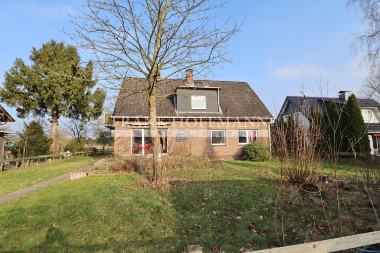 Immobilienangebot - Hartenholm - Alle - Teilvermietetes Einfamilienhaus mit Einliegerwohnung in schöner Lage von Hartenholm