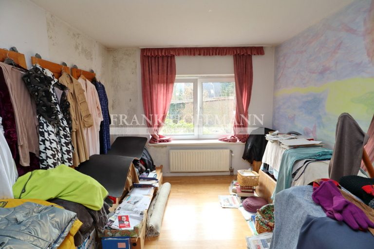 Immobilienangebot - Hartenholm - Alle - Teilvermietetes Einfamilienhaus mit Einliegerwohnung in schöner Lage von Hartenholm