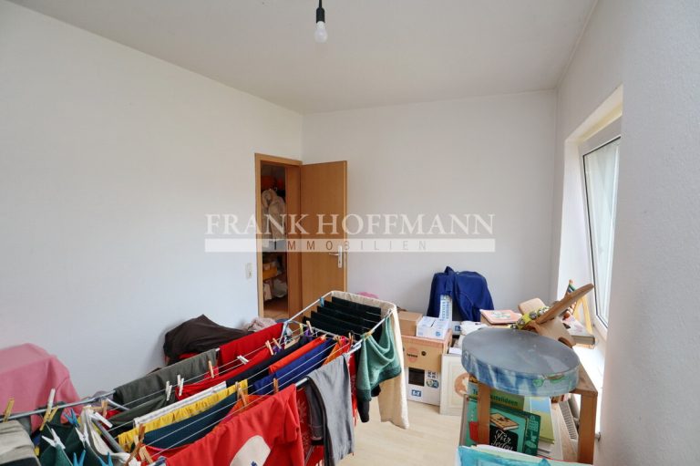 Immobilienangebot - Hartenholm - Alle - Teilvermietetes Einfamilienhaus mit Einliegerwohnung in schöner Lage von Hartenholm