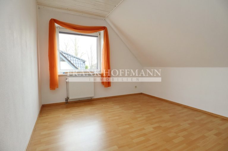 Immobilienangebot - Hartenholm - Alle - Teilvermietetes Einfamilienhaus mit Einliegerwohnung in schöner Lage von Hartenholm