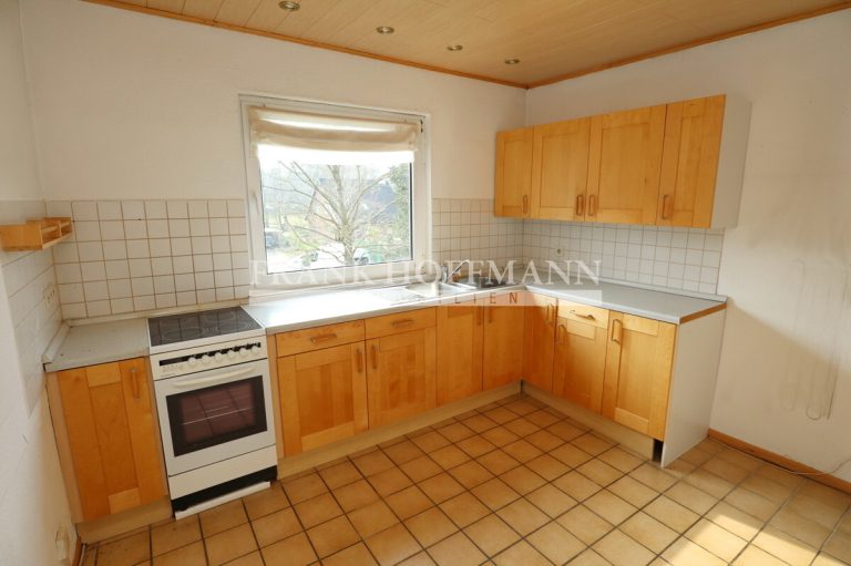 Immobilienangebot - Hartenholm - Alle - Teilvermietetes Einfamilienhaus mit Einliegerwohnung in schöner Lage von Hartenholm