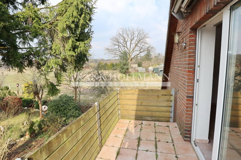 Immobilienangebot - Hartenholm - Alle - Teilvermietetes Einfamilienhaus mit Einliegerwohnung in schöner Lage von Hartenholm