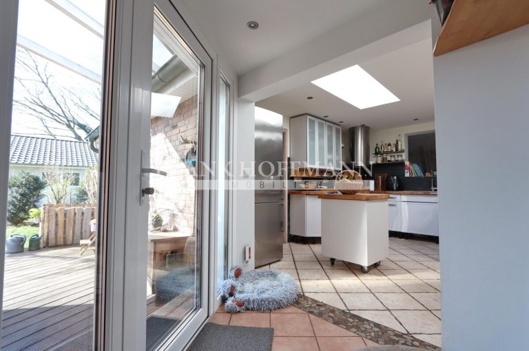 Immobilienangebot - Quickborn - Alle - Einzigartiges, buntes Zuhause mit modernem Anbau und Gartenparadies