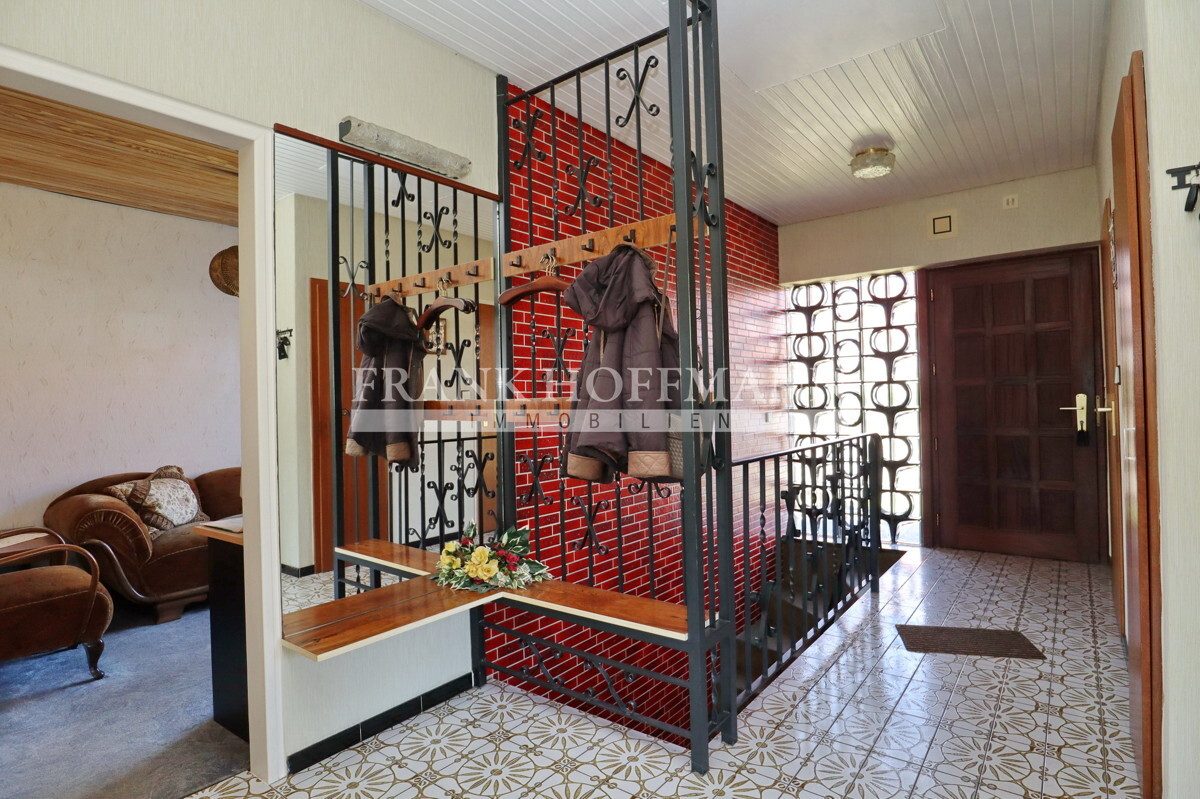 Immobilienangebot - Großenaspe - Haus_Wohnung - Lichtdurchflutetes Einfamilienhaus über zwei Ebenen in ruhiger Wohnlage von Großenaspe