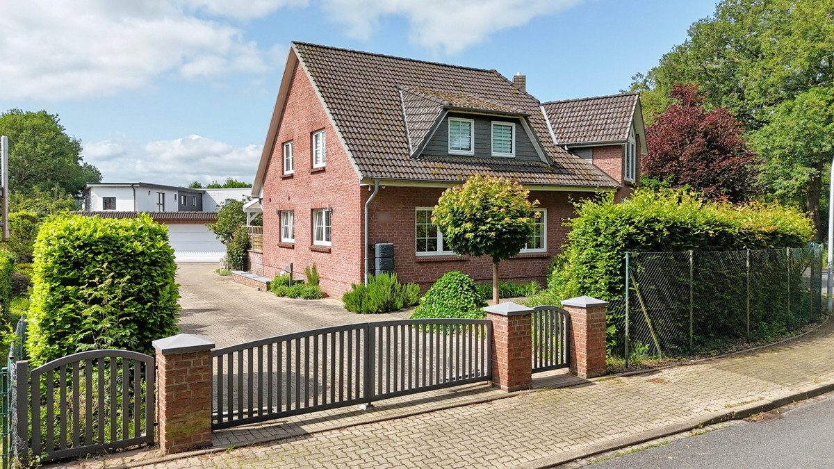 Immobilienangebot - Holm - Haus_Wohnung - Großzügige & gepflegte Doppelhaushälfte mit Vollkeller in Holm