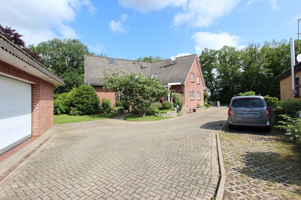Immobilienangebot - Holm - Haus_Wohnung - Großzügige & gepflegte Doppelhaushälfte mit Vollkeller in Holm