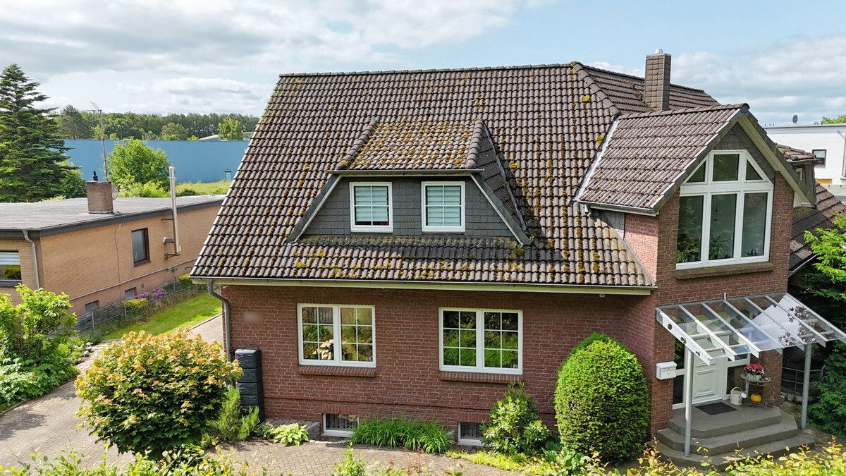 Immobilienangebot - Holm - Haus_Wohnung - Großzügige & gepflegte Doppelhaushälfte mit Vollkeller in Holm