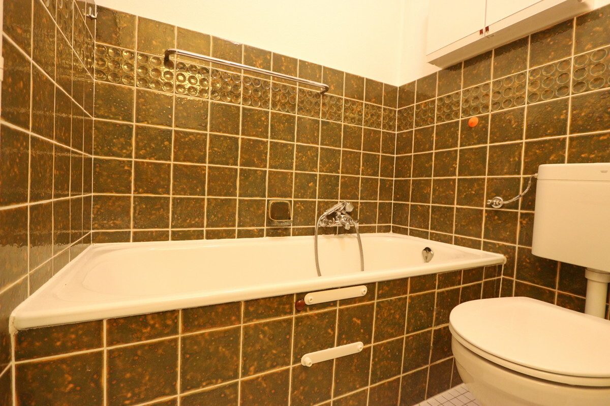 Immobilienangebot - Henstedt-Ulzburg - Haus_Wohnung - Teilweise modernisiertes Mittelreihenhaus mit Renovierungsbedarf in Henstedt-Ulzburg !