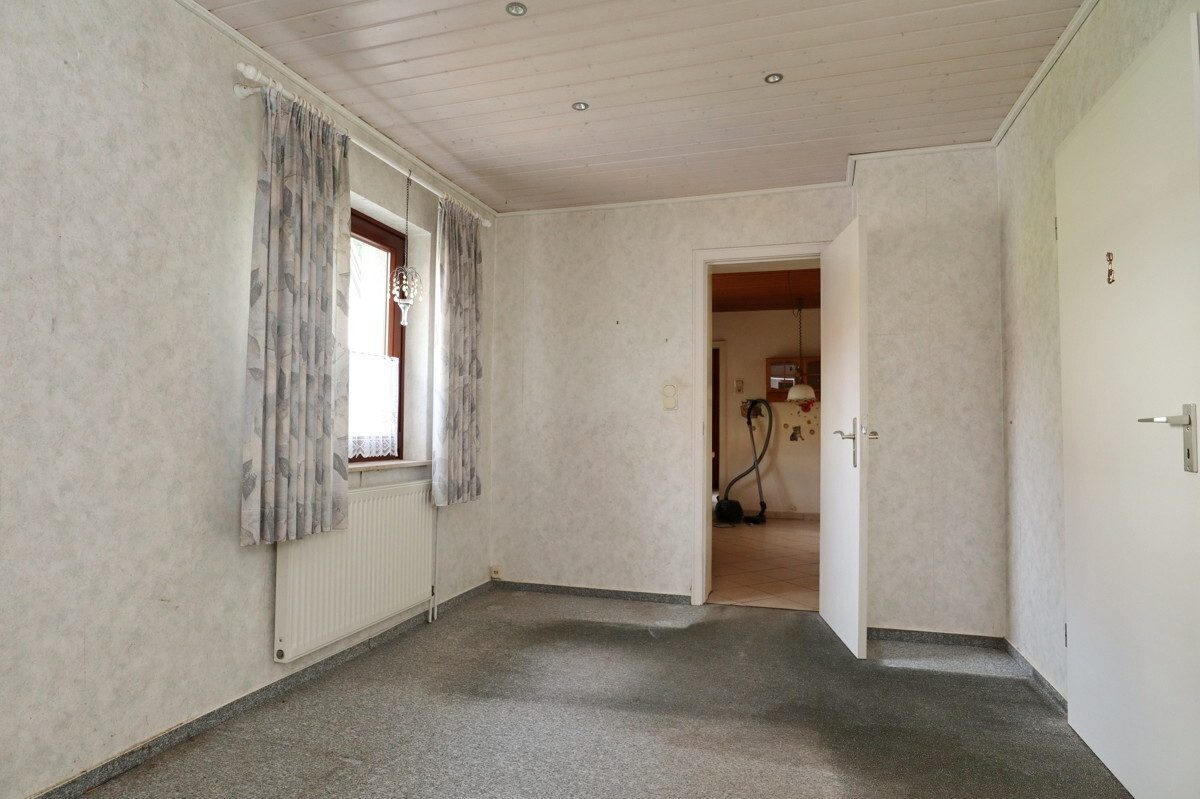 Immobilienangebot - Kaltenkirchen - Haus_Wohnung - Modernisierungsbedürftiges Einfamilienhaus mit Platz für die ganze Familie auf großem Grundstück