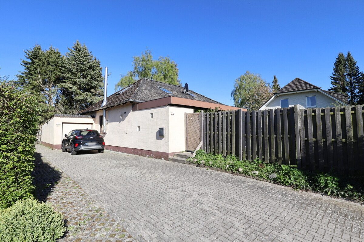 Immobilienangebot - Sievershütten - Alle - Vermietetes Einfamilienhaus auf attraktivem Grundstück in Sievershütten
