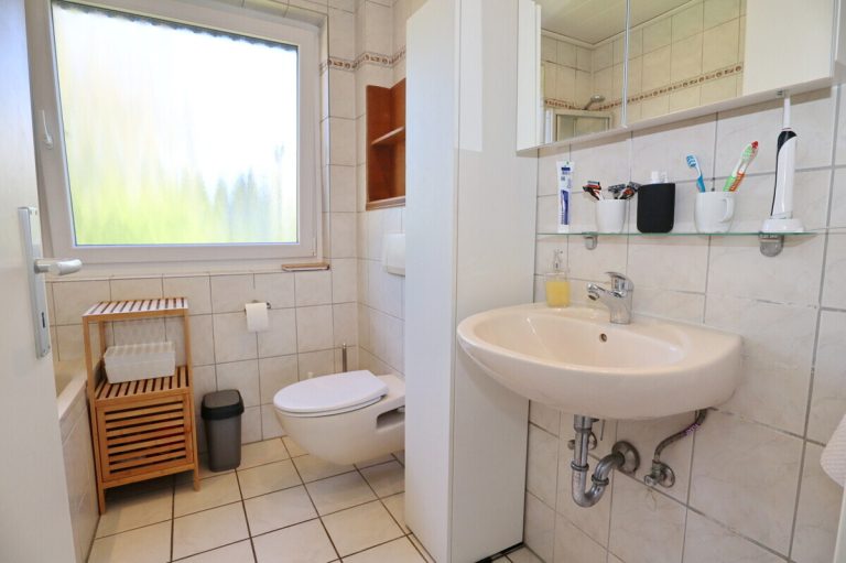 Immobilienangebot - Sievershütten - Alle - Vermietetes Einfamilienhaus auf attraktivem Grundstück in Sievershütten