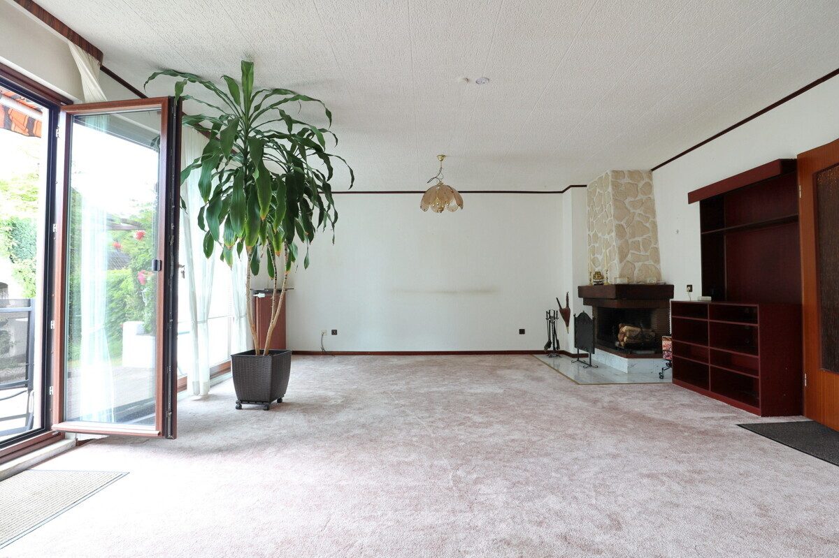 Immobilienangebot - Henstedt-Ulzburg - Haus_Wohnung - Erbpacht! Zentral gelegene Doppelhauhälfte mit Vollkeller und Carport