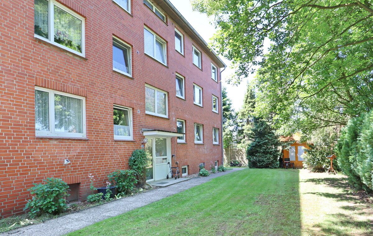 Frontansicht Immobilienangebot - Lentföhrden - Haus_Wohnung - PROVISIONSFREI: Kapitalanlage in Lentföhrden - Vermietete Wohnung mit Entwicklungspotenzial