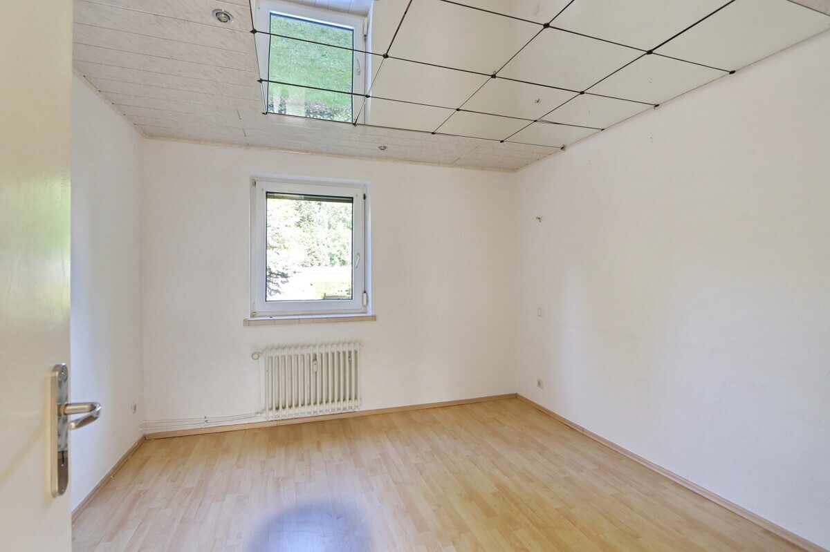 Schlafzimmer EG Immobilienangebot - Norderstedt - Haus_Wohnung - Großes Mittelreihenhaus mit 2 Einheiten und Carport in Norderstedt