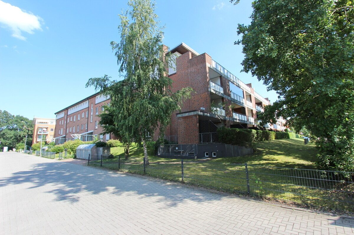 Gebäudeansicht Immobilienangebot - Norderstedt - Alle - Langfristige vermietete 2-Zimmer-Terrassenwohnung mit TG-Stellplatz in Norderstedt/Garstedt