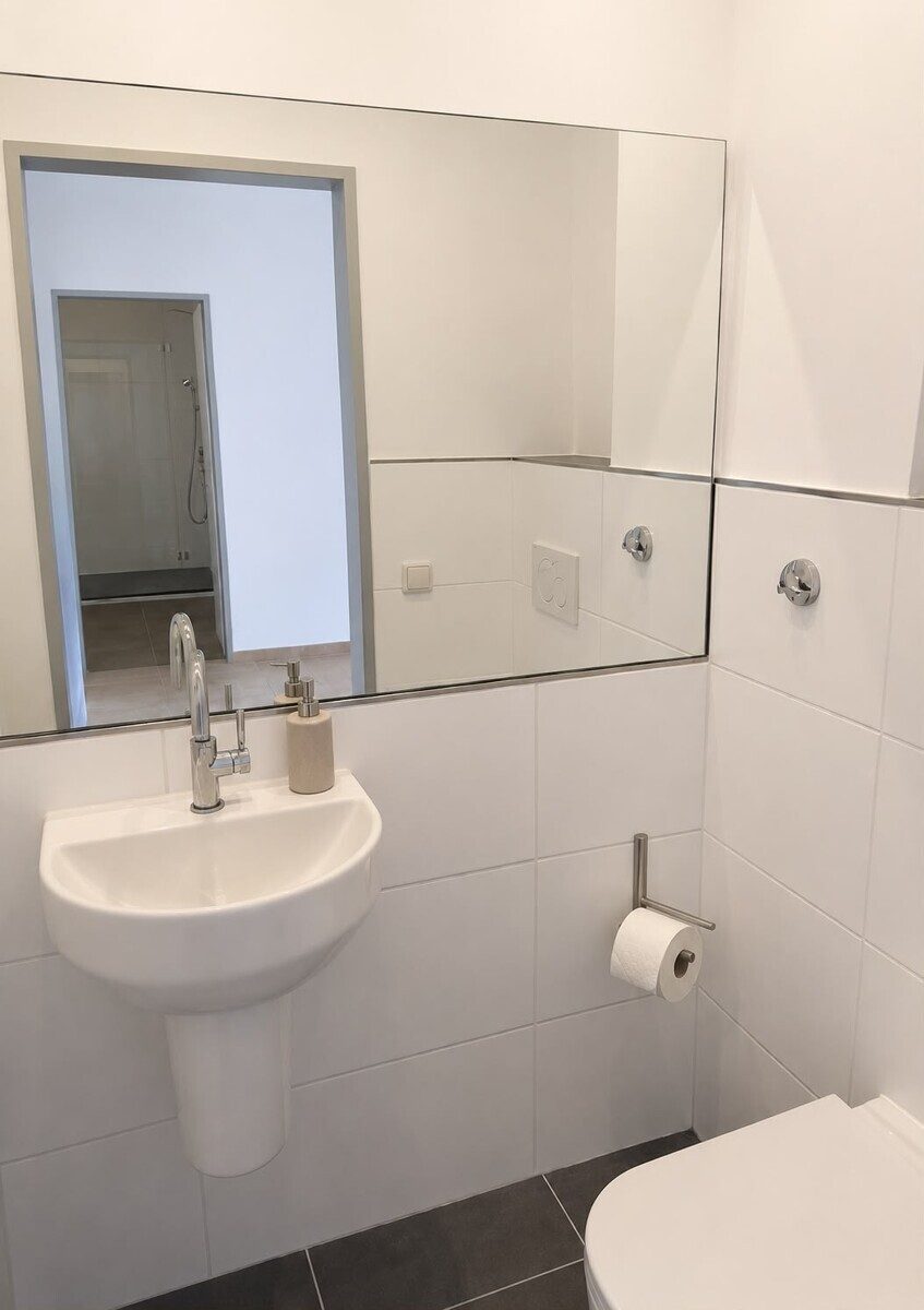 Immobilienangebot - Hasloh - Alle - Gepflegte & Vermietete 2,5-Zimmer-Eigentumswohnung mit Balkon & zwei Stellplätzen in Hasloh