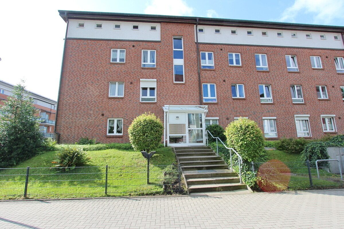 Immobilienangebot - Norderstedt - Haus_Wohnung - Perfekt für Singles - 1,5-Zi-Wohnung mit großem Balkon & TG-Stellplatz in Norderstedt-Garstedt