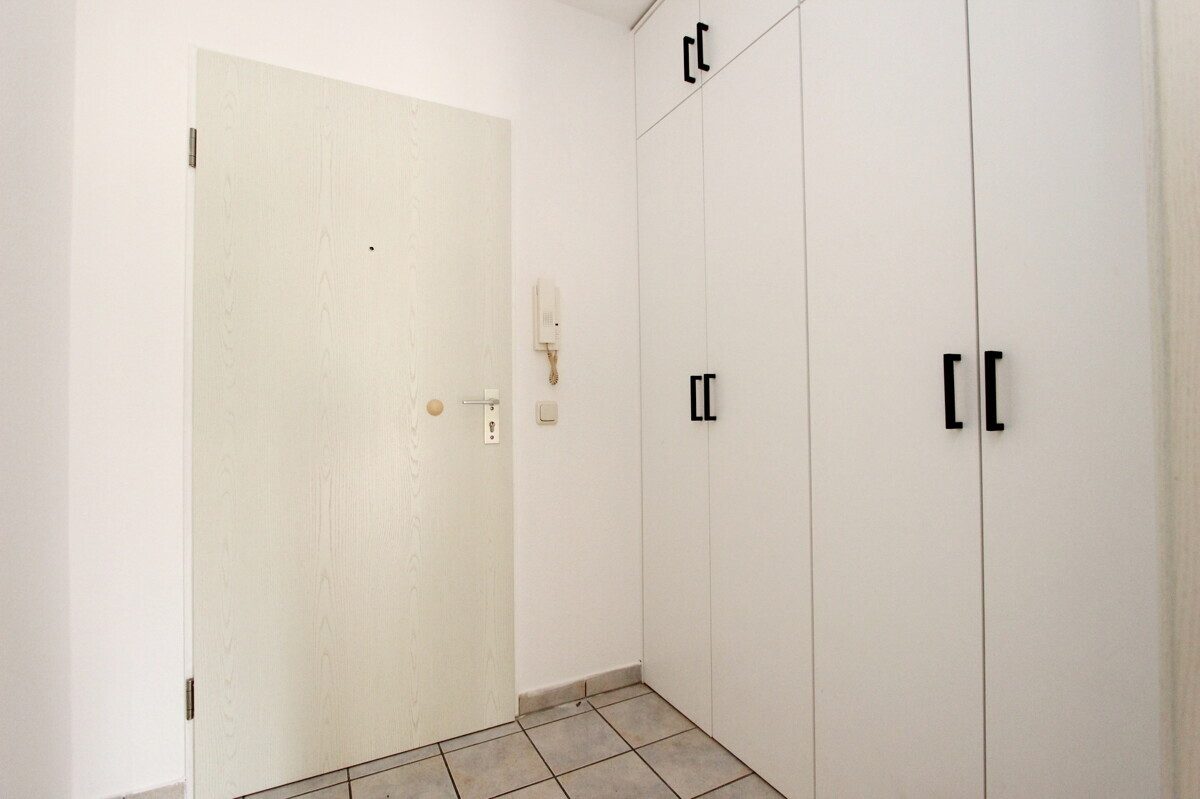 Immobilienangebot - Norderstedt - Haus_Wohnung - Perfekt für Singles - 1,5-Zi-Wohnung mit großem Balkon & TG-Stellplatz in Norderstedt-Garstedt