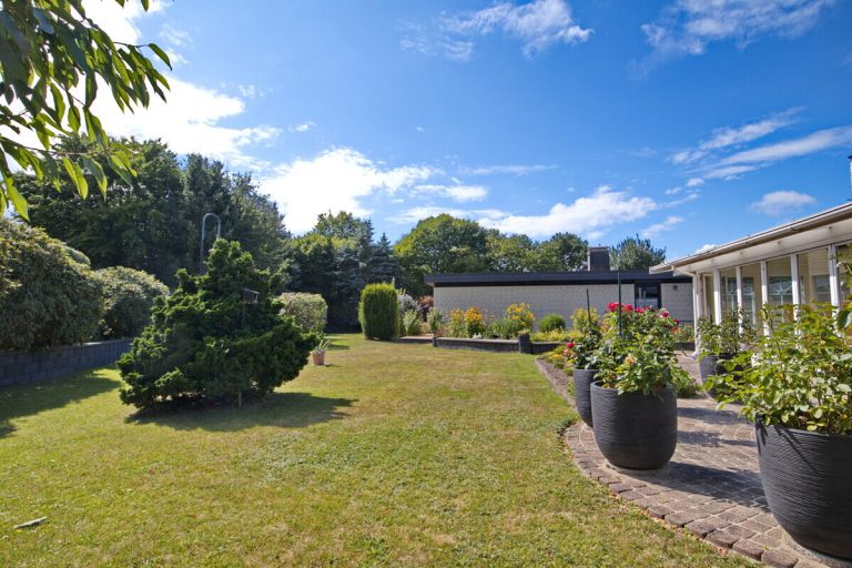 Immobilienangebot - Kisdorf - Haus_Wohnung - Gut geschnittener Bungalow mit Wintergarten und Carport auf schönem Grundstück in Kisdorf