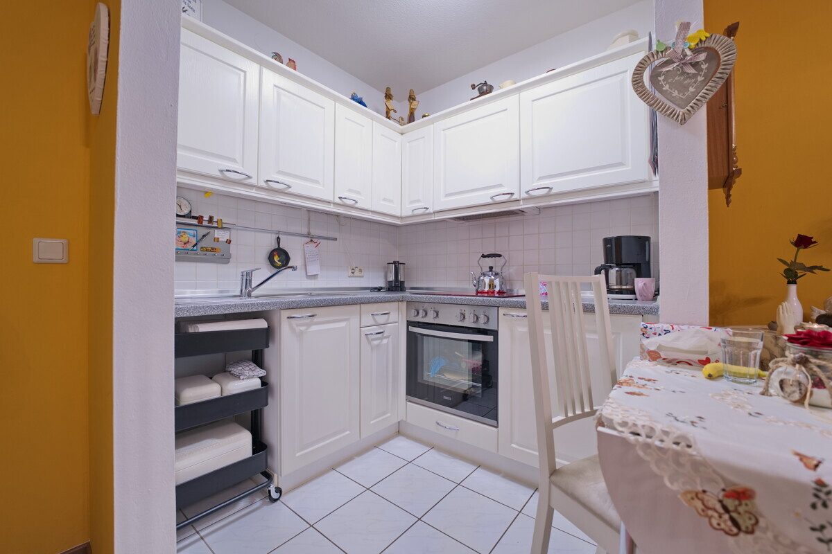 Immobilienangebot - Henstedt-Ulzburg - Alle - Kapitalanlage! vermietete 2 Zi.Wohnung mit TG-Stellplatz in Henstedt-Ulzburg