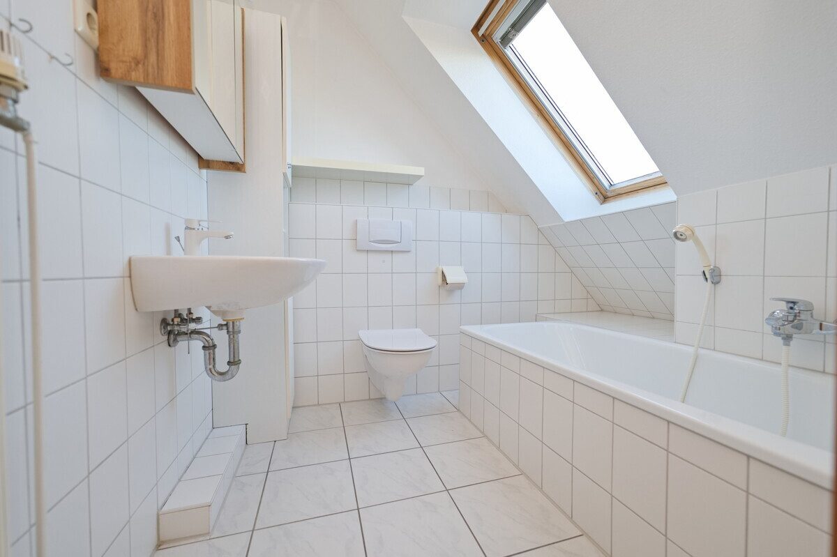 Immobilienangebot - Barmstedt - Haus_Wohnung - Wohnen auf zwei Ebenen: Attraktive 3-Zimmer-Maisonettewohnung im Zentrum von Barmstedt