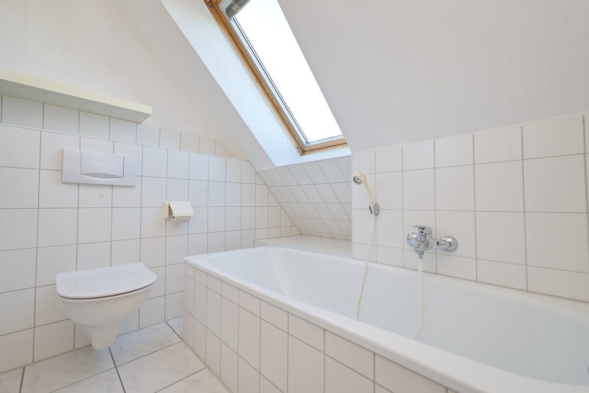 Immobilienangebot - Barmstedt - Haus_Wohnung - Wohnen auf zwei Ebenen: Attraktive 3-Zimmer-Maisonettewohnung im Zentrum von Barmstedt