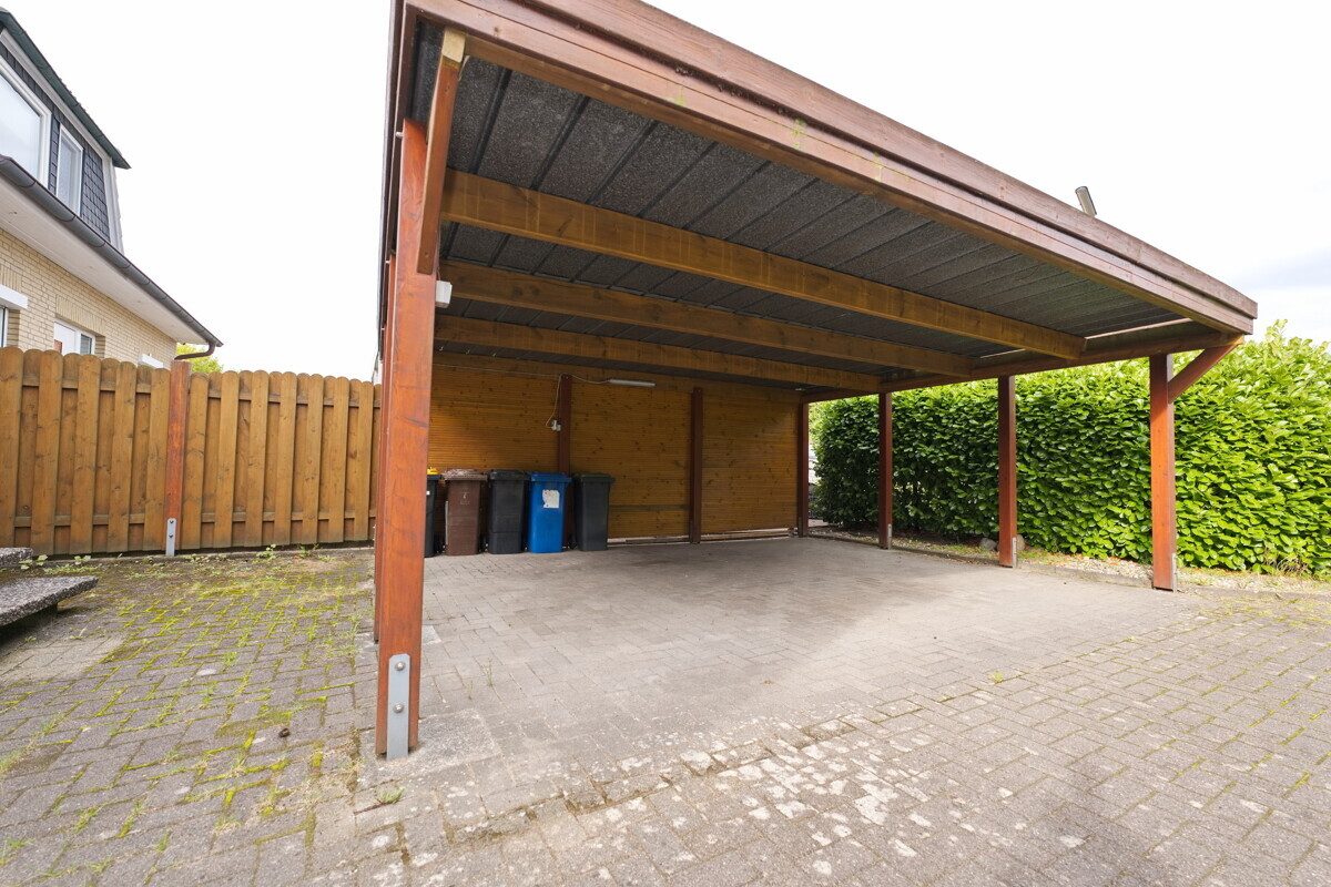 Immobilienangebot - Ellerbek - Haus_Wohnung - Gepflegte Doppelhaushälfte mit Doppelcarport und attraktiven Grundstück vor den Toren Hamburgs in Ellerbek