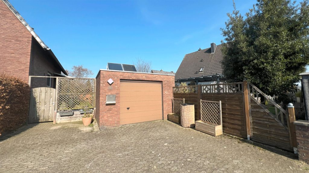 Volksbank Immobilien Niederrhein GmbH - Immobilienangebot - Rees - Alle - Charmante Hochparterre in Rees-Haffen – ruhige Sackgassenlage mit Terrasse und Garage