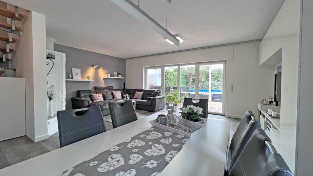 Volksbank Immobilien Niederrhein GmbH - Immobilienangebot - Rheinberg - Alle - Wohlfühlzuhause mit Stil – Doppelhaushälfte mit Pool, Sauna & Garten in Rheinberg-Budberg!