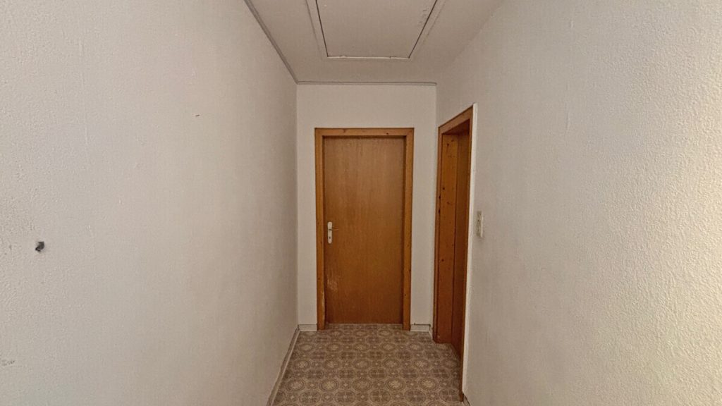 Volksbank Immobilien Niederrhein GmbH - Immobilienangebot - Voerde - Alle - Gepflegtes Zweifamilienhaus in Voerde-Spellen mit großem Grundstück!