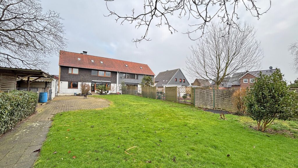 Volksbank Immobilien Niederrhein GmbH - Immobilienangebot - Voerde - Alle - Gepflegtes Zweifamilienhaus in Voerde-Spellen mit großem Grundstück!